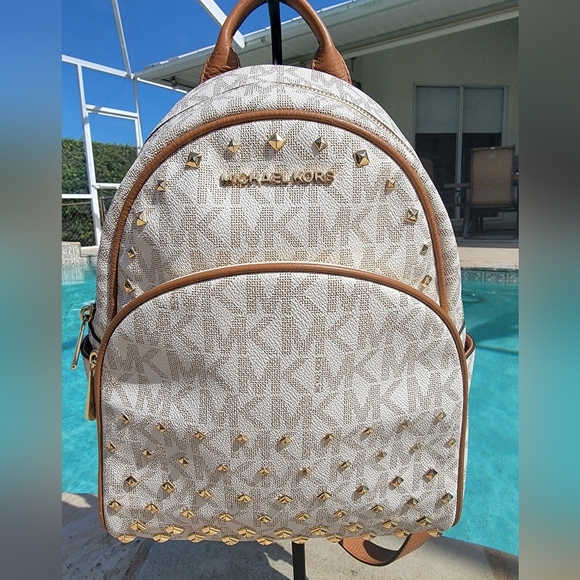 Michael Kors Handbags - Michael Kors Vanilla Cream Medium Abbey Signature Gold Studded Backpack/Tan Trim